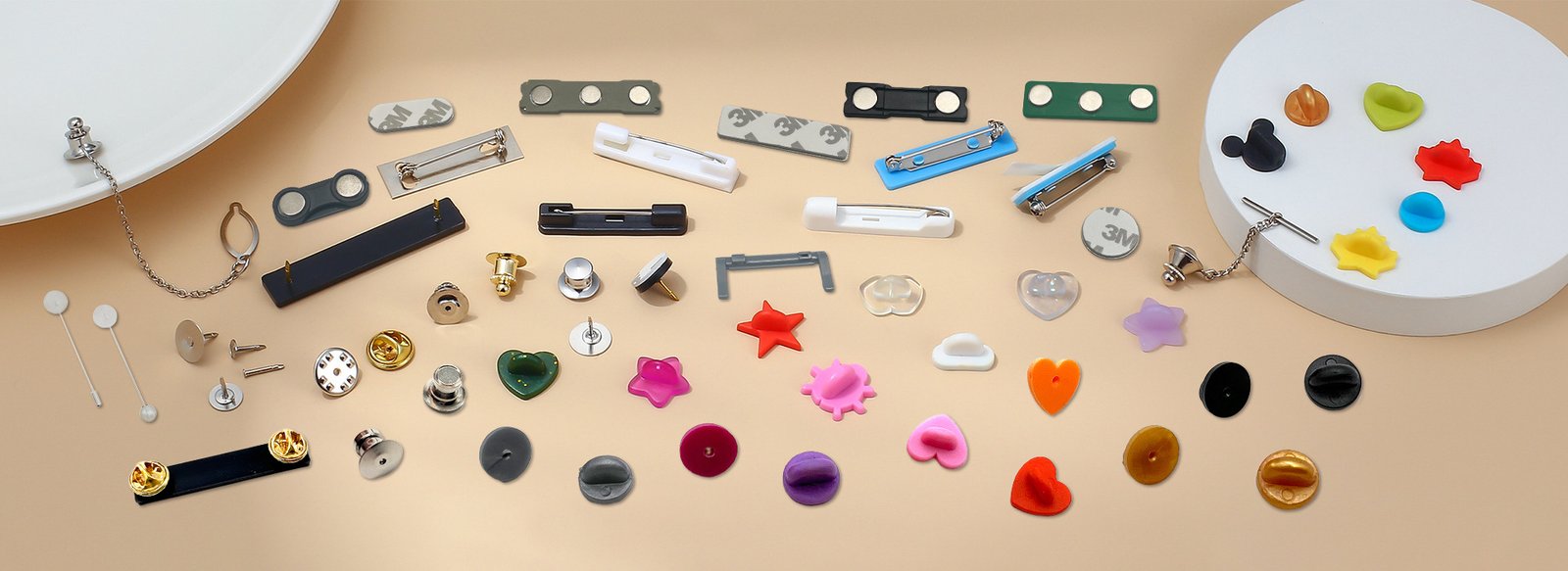 Comparison of enamel pin backing types: butterfly clutch, rubber clutch, locking pin back, magnetic and double-lock backings