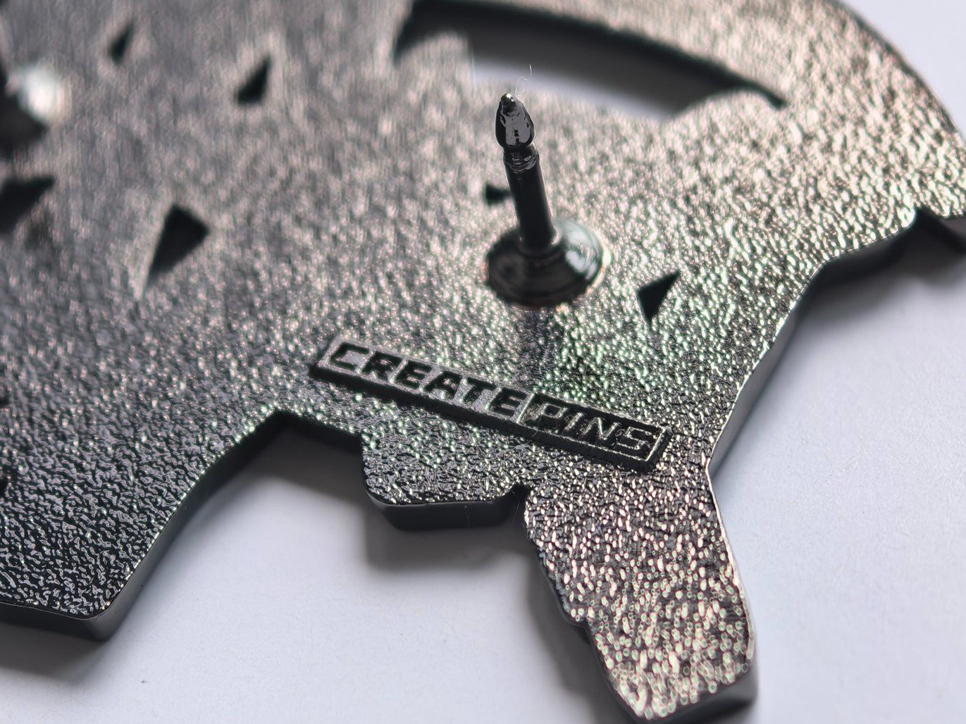 Back stamp customization for enamel pins