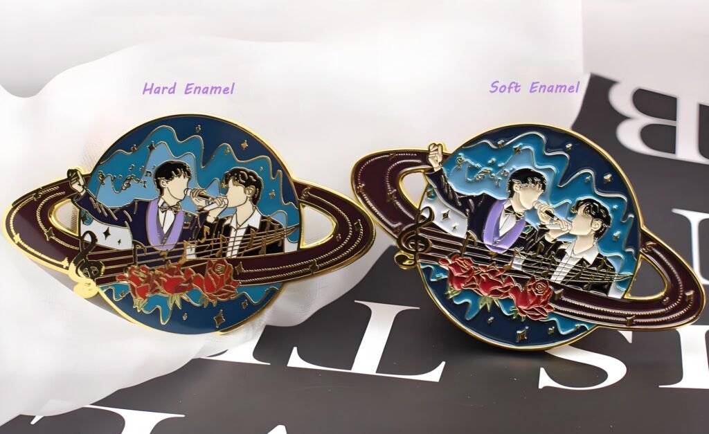Comparison of hard enamel pins and soft enamel pins showing differences in texture, color depth, metal lines